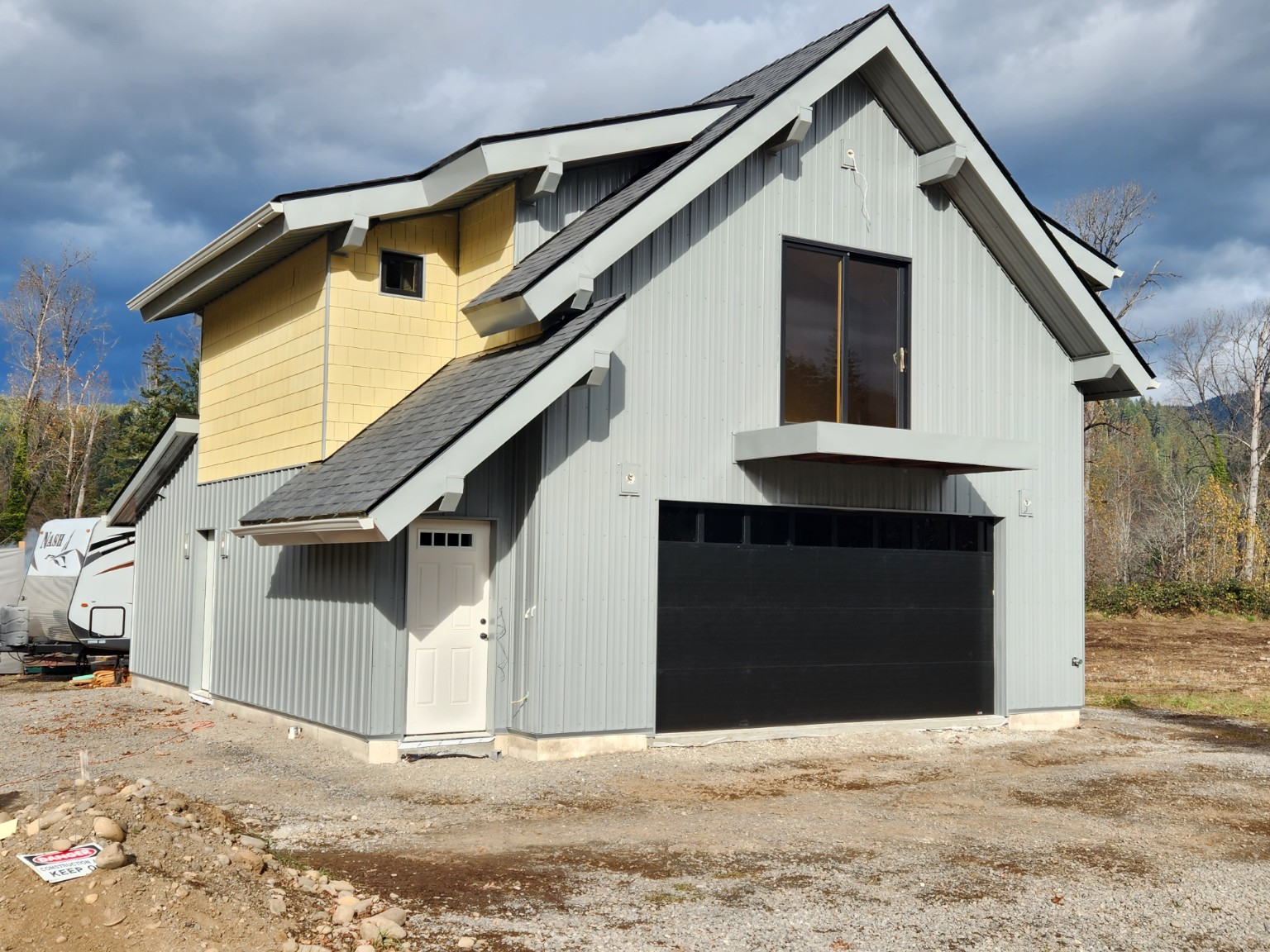 Detailed metal-sided post-frame garage built in Oregon